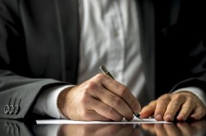_0009_Person Signing a Will